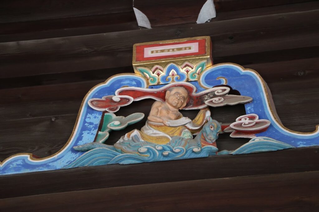 北野天満宮本殿・黄安仙人の蟇股
